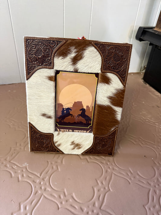 Cowhide and tooled leather frame